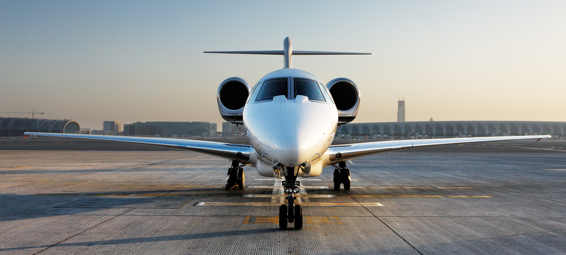 A front on view of a private jet